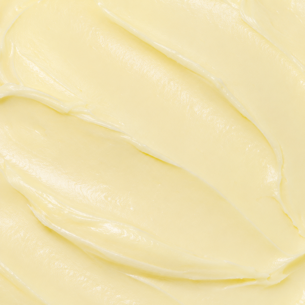 Close-up texture of Rivahna Cold Paraffin Mask, a rich creamy moisturizing treatment designed to hydrate, soften, and repair dry cracked skin on hands, feet, and body.